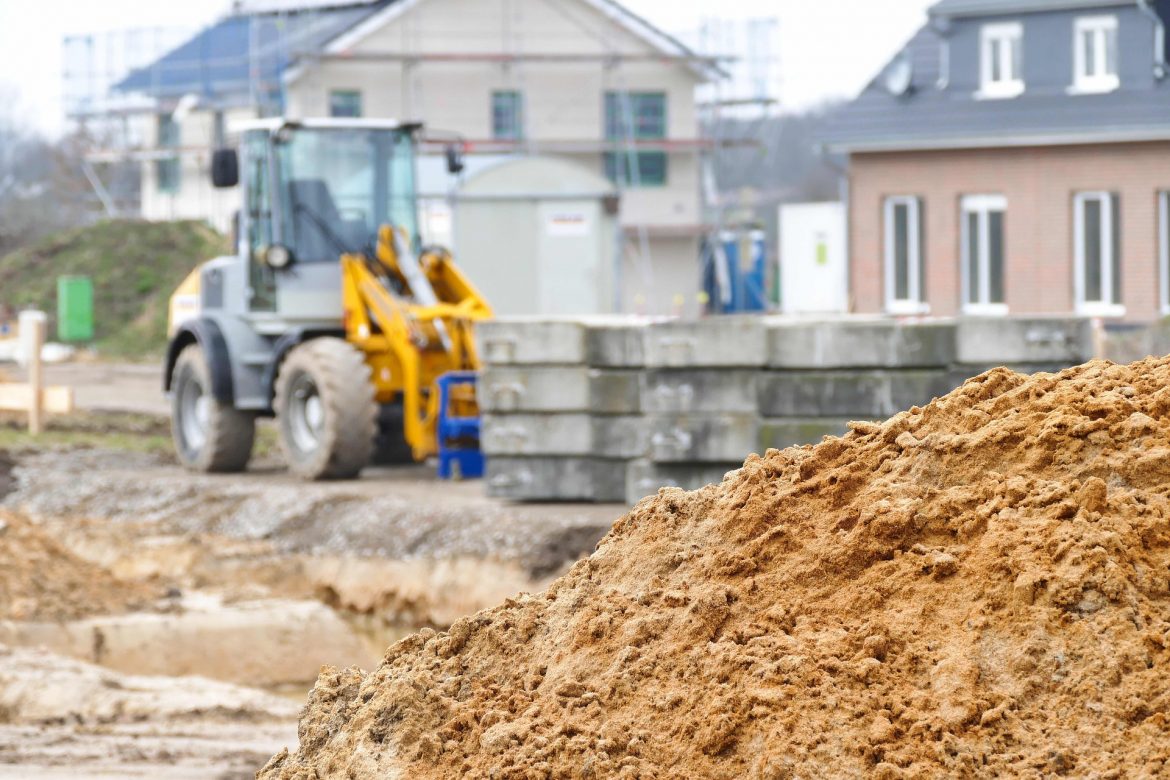 digger on a housing construction site